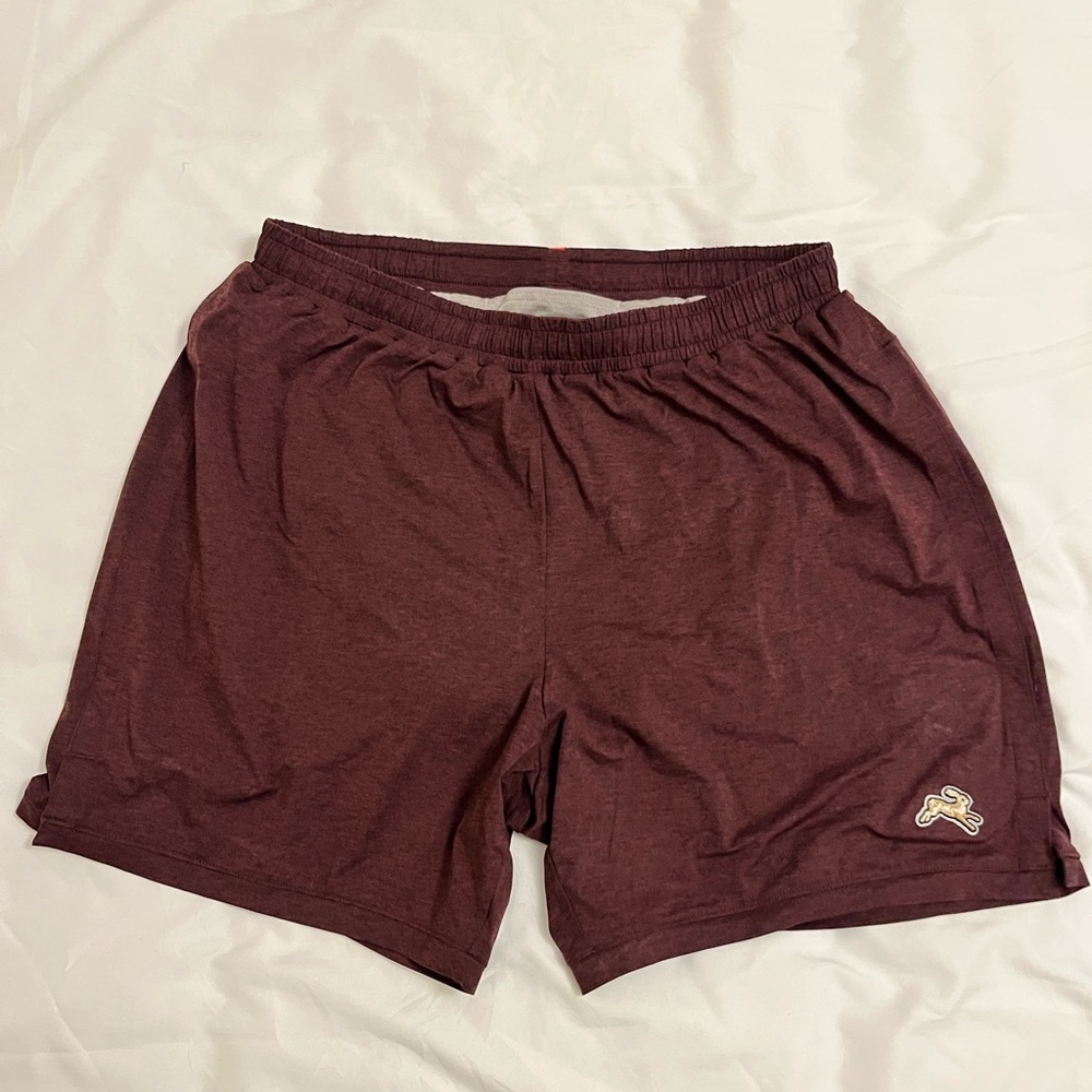 Tracksmith 5” session short in wine